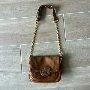 Tory Burch tan crossbody bag.